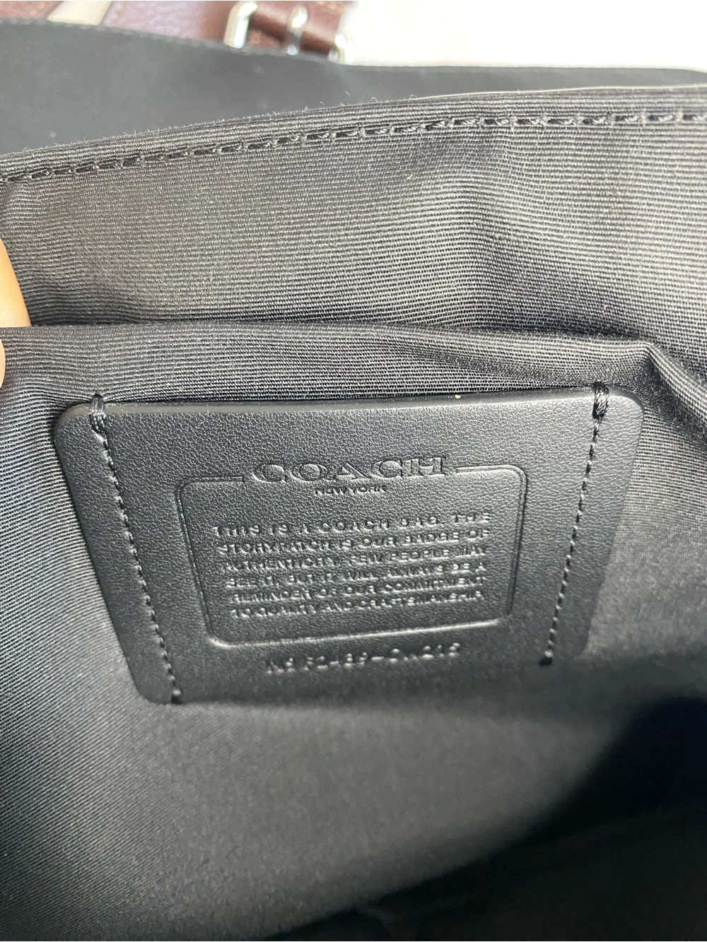 Coach Warner Messenger bag Pebbled Leather Chocolate brown